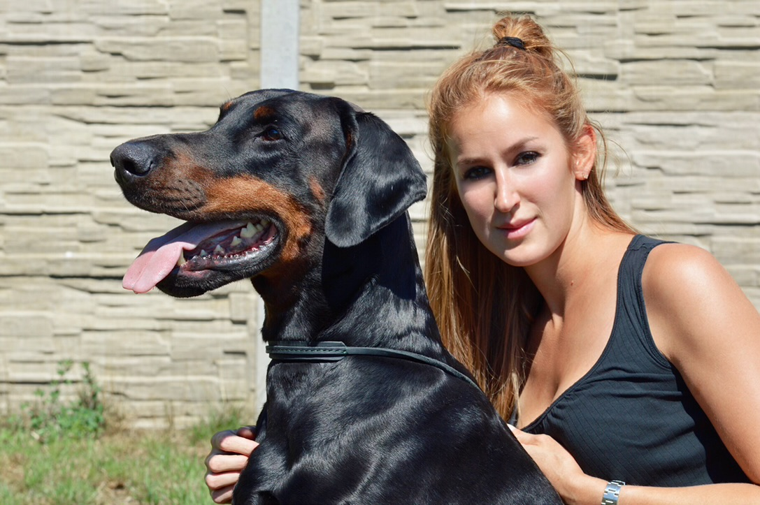 Thoraya Legacy with a Dobermann