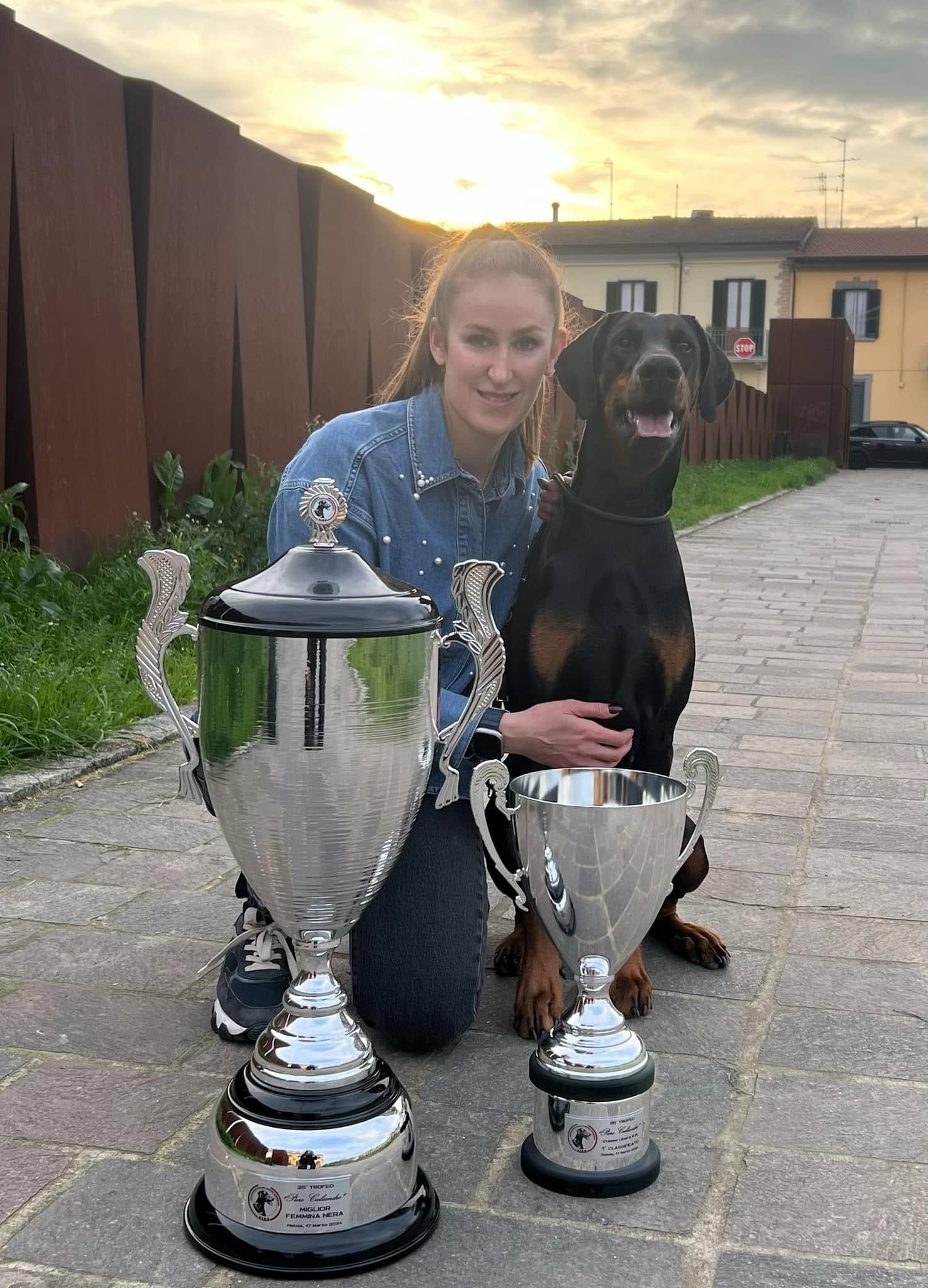Artemis with her owner and trophies